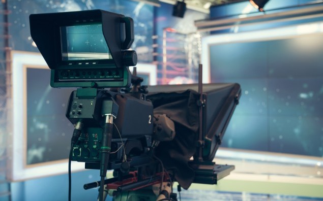 Television studio with camera and lights – recording TV NEWS