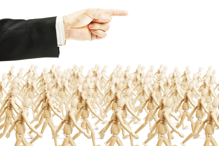 Many people going in shown direction. Concept of full obedience
